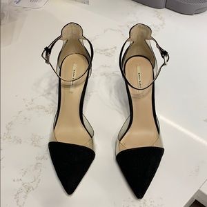 Black suede pumps with clear detail